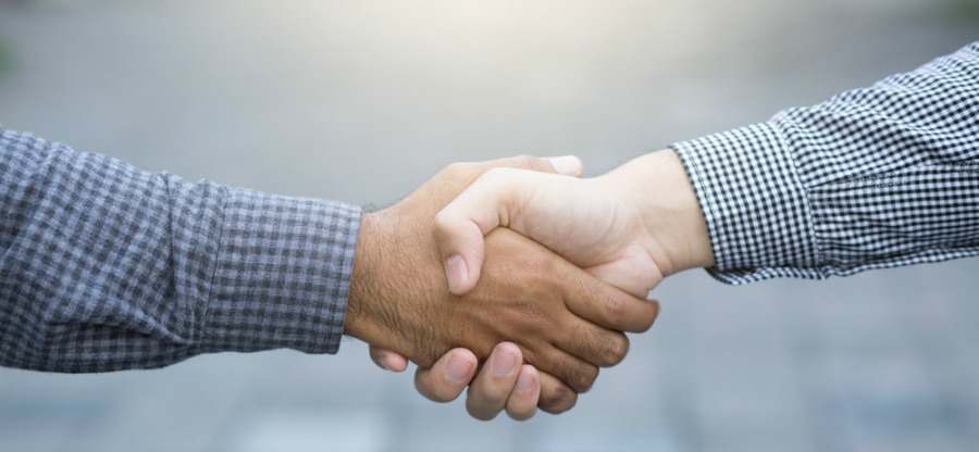 Two Business Partners Shaking Hands