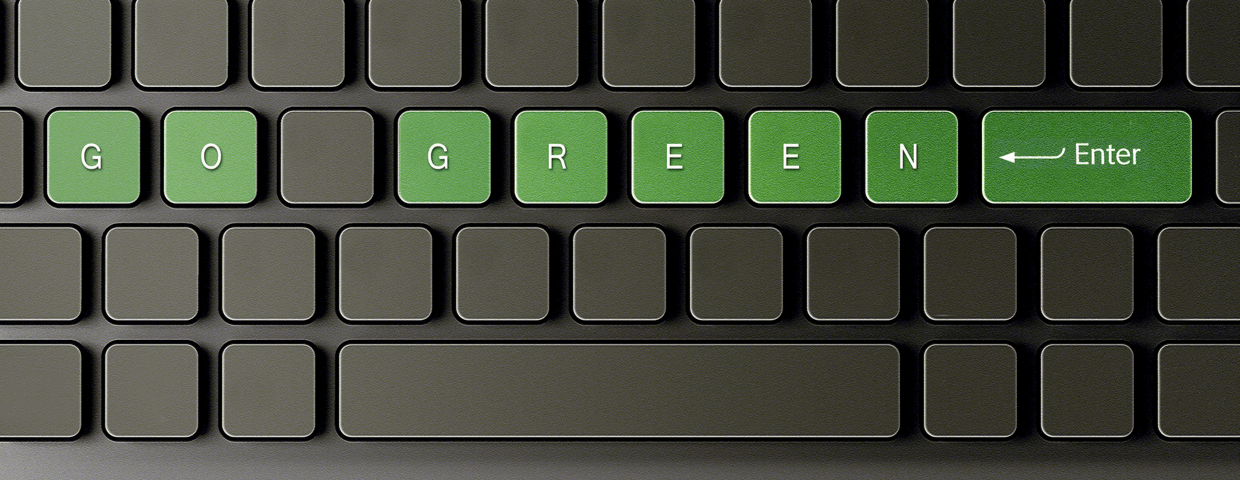 Keyboard with the words 'go green' on keys.