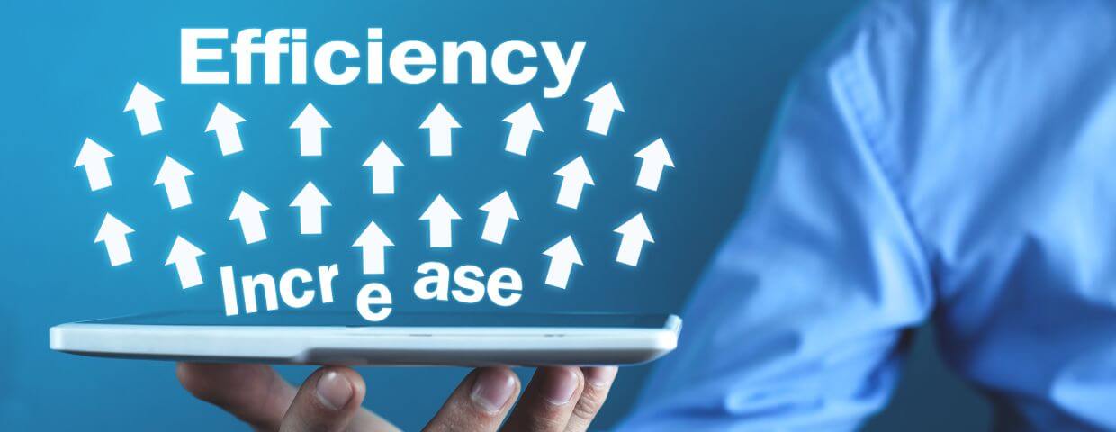 Arrows and words Efficiency Increase above a tablet held by businessman